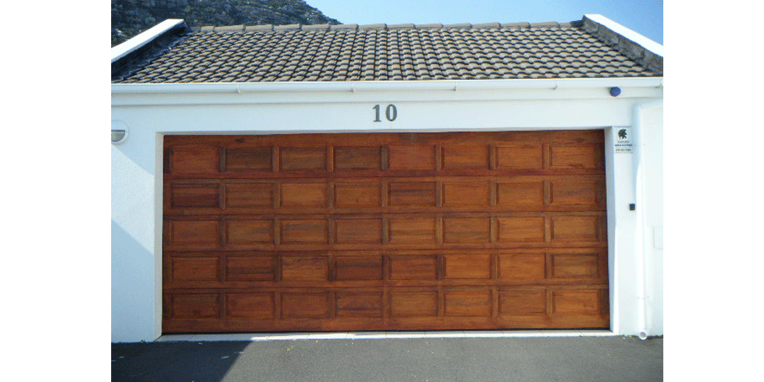 Double raised & fielded ( blocks ) meranti sectional door