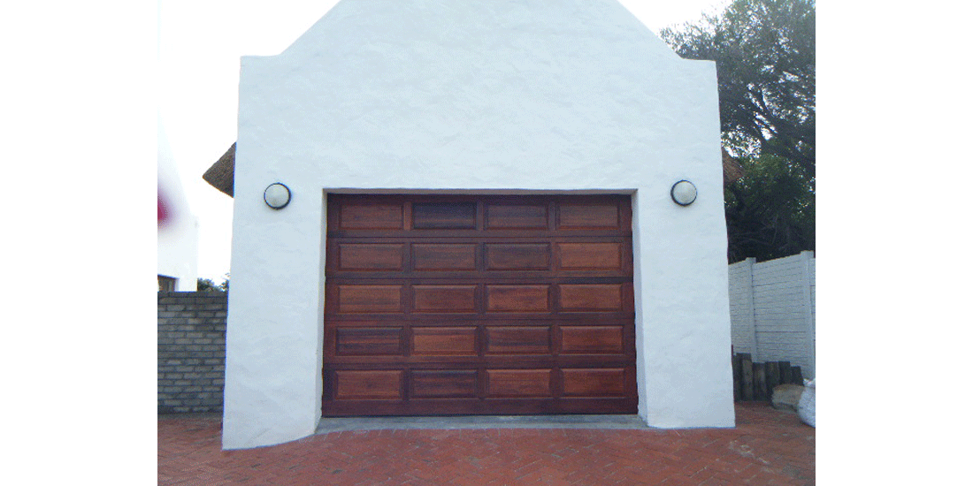 Single raised & fielded ( blocks ) meranti sectional door